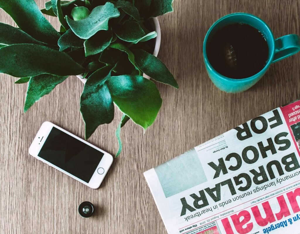 newspaper with cup of coffee